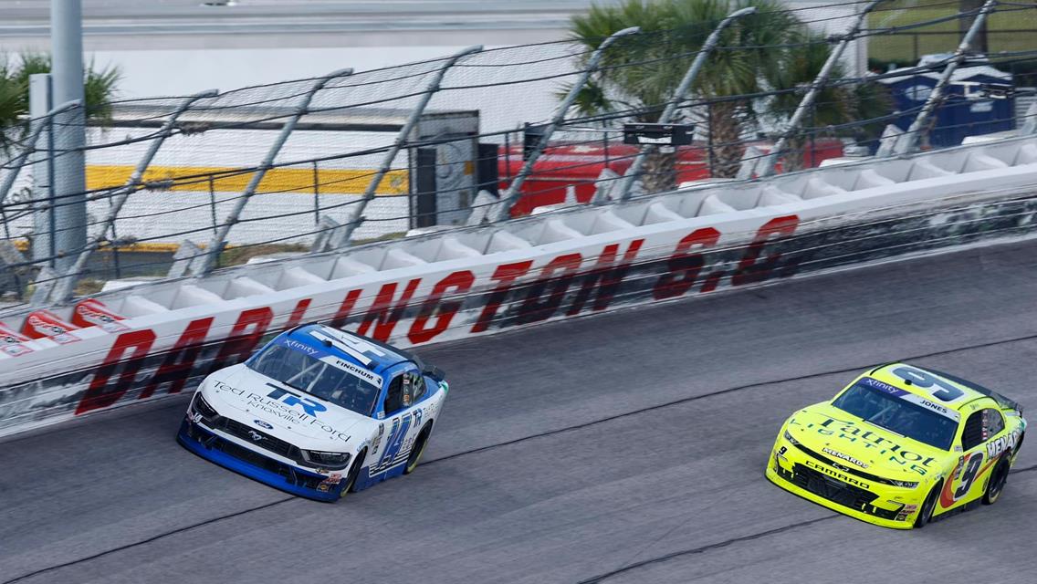 Chad Finchum behind the wheel of the Ted Russell Ford No. 14 SS GreenLight Racing / Ford Mustang at Darlington (S.C.) Raceway on August 31.