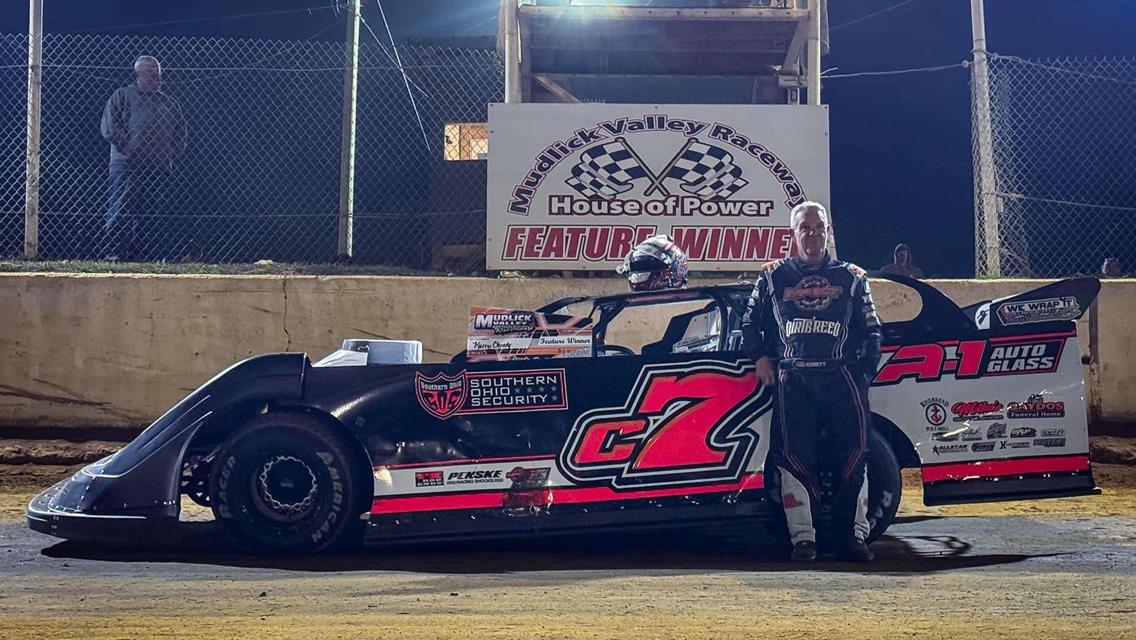 Christy Wins at Mudlick
