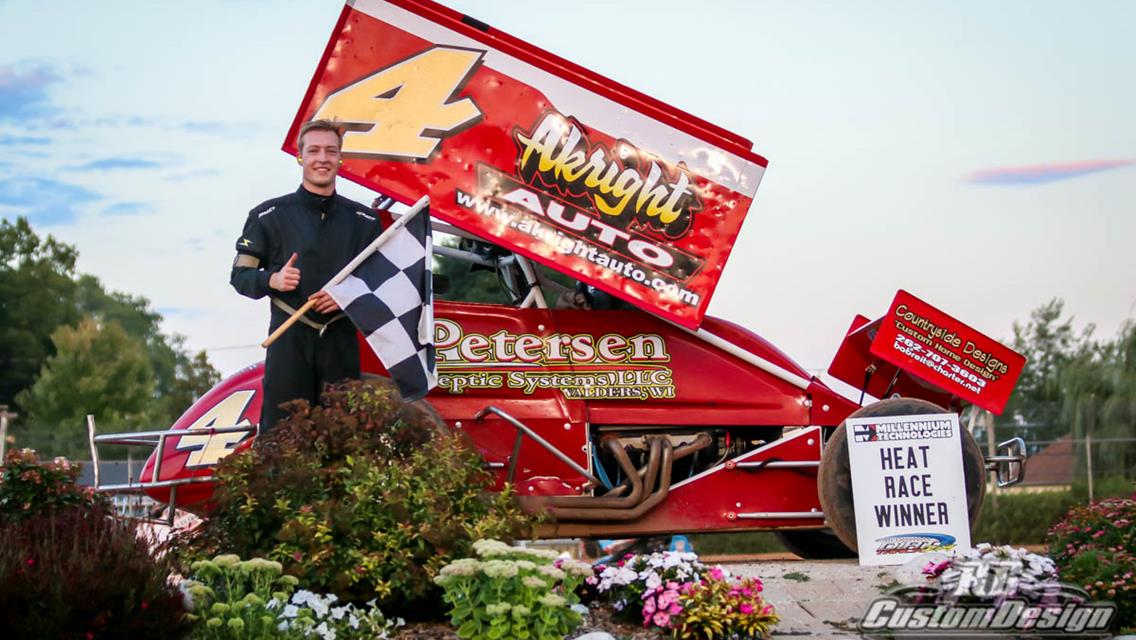 Alex Pokorski stands tall on Plymouth Dirt Track Racing 360 Sprint Car podium