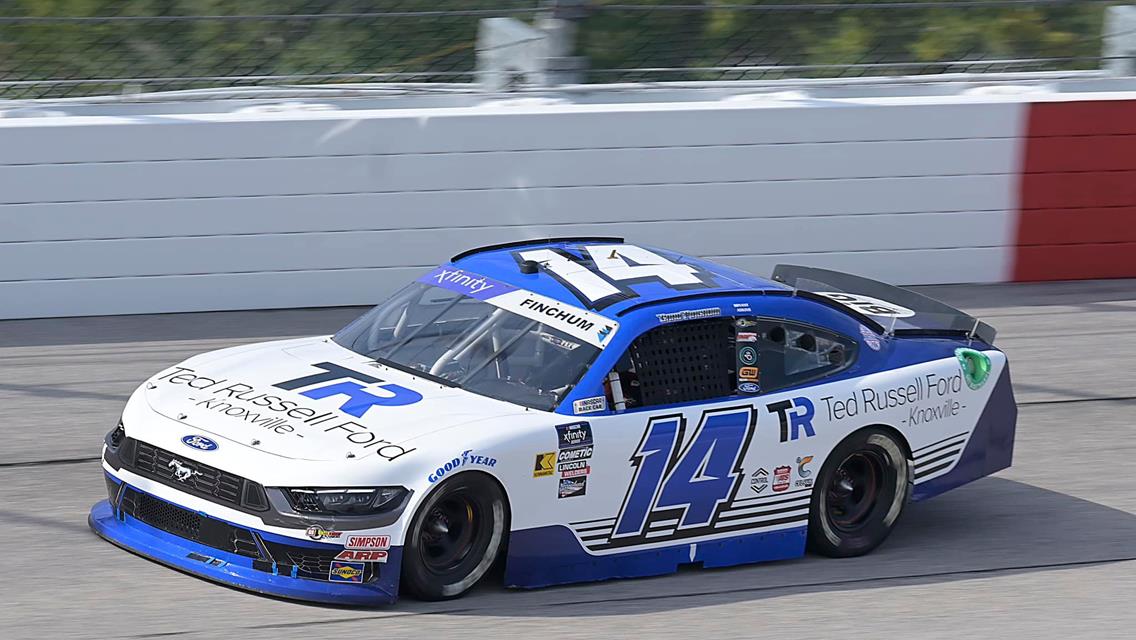 Chad Finchum behind the wheel of the Ted Russell Ford No. 14 SS GreenLight Racing / Ford Mustang at Darlington (S.C.) Raceway on August 31.