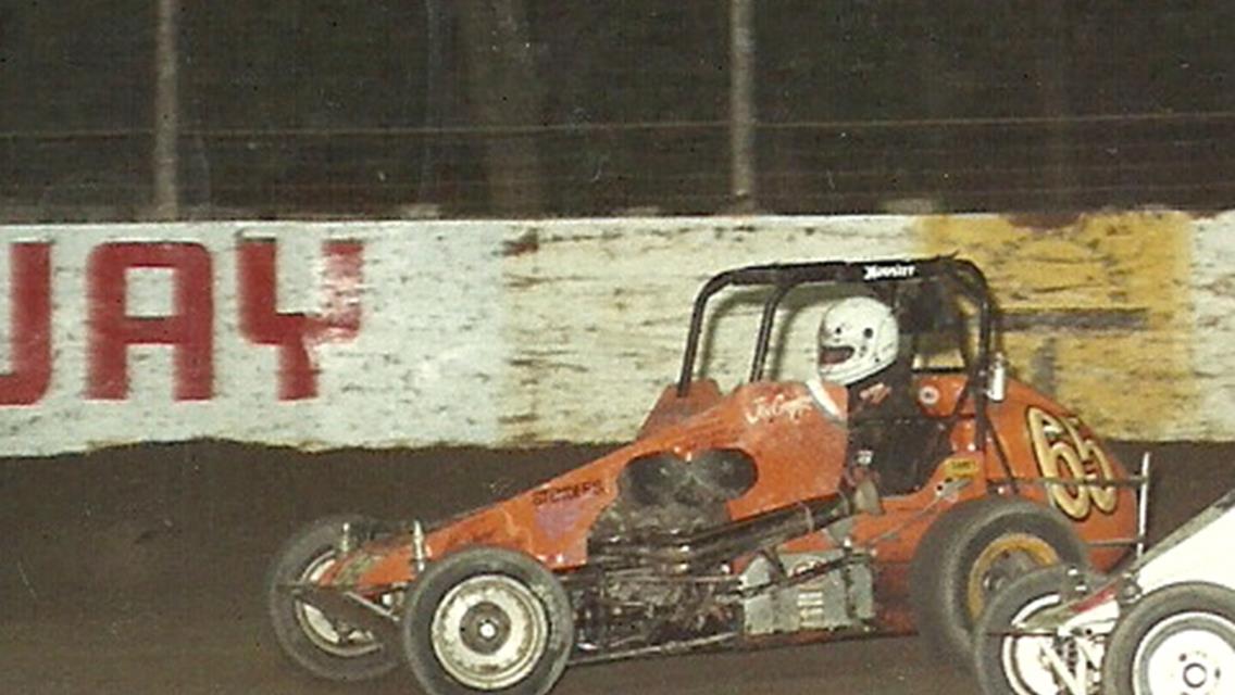 Joe Corrigan driving the Corrigan Mfg owned Earnest Ford sponsored #65 in 1987 race action.