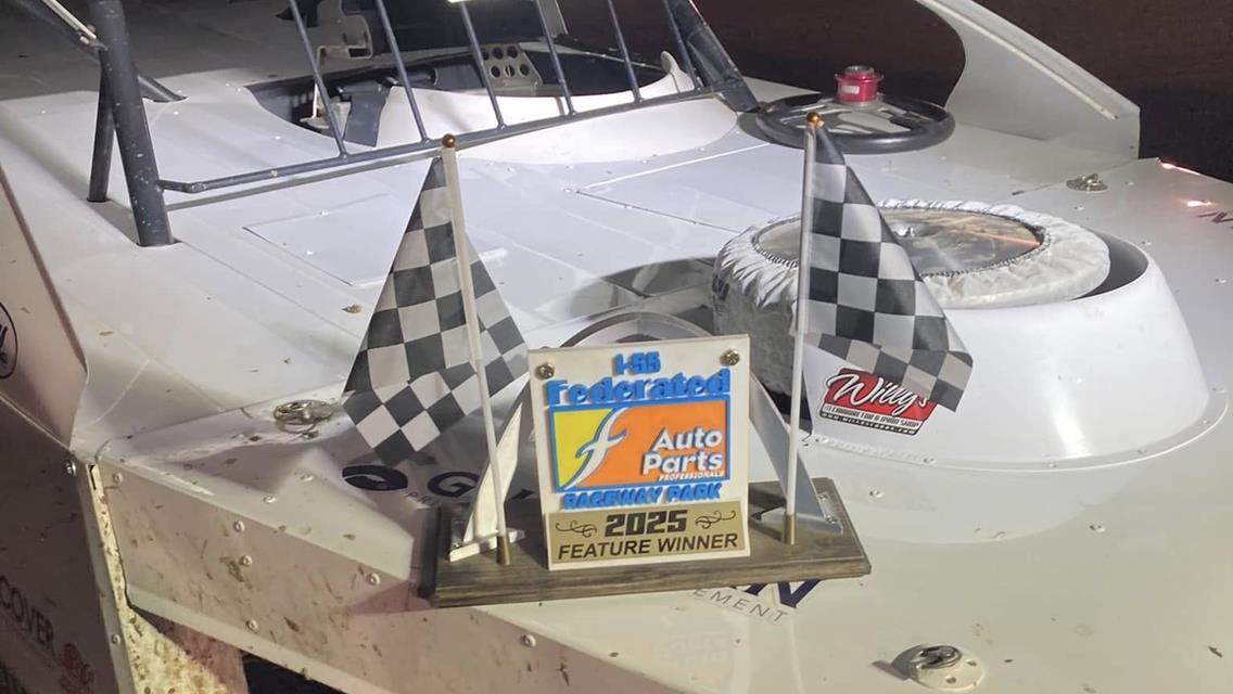 Ken celebrating in victory lane after winning on July 5 at I-55 Federated Auto Parts Raceway.