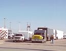 The modern day version of the Oklahoma Land Run, as haulers sit three-wide around the Tulsa Expo Center in line for Chili Bowl pit parking.
