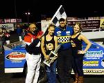 Zomer grabs Huset’s checkereds