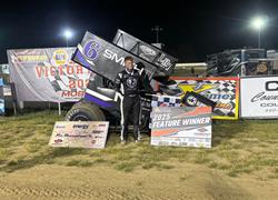 Selvage Holds off Danley to score