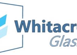 WHITACRE GLASS SIGNS ON AS THE 201