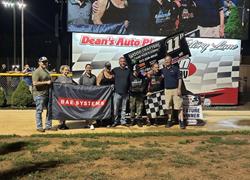 STUTTS CRUISES TO VICTORY; Mitten