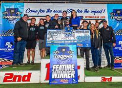 JOEL MYERS JR CLAIMS TROPHY CUP CH