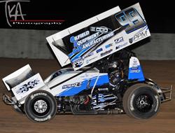 Bacon and Clauson take Western World Opener