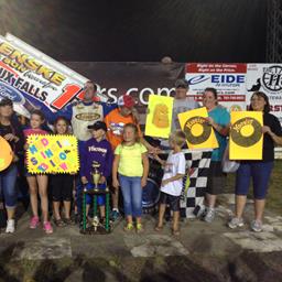 Mark and some of his fans celebrate his 100th win at River Cities Speedway