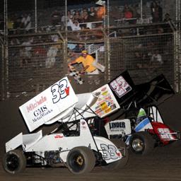 The checkered flag flies upon Henry Van Dam in Monday night&amp;#39;s ASCS Northwest Speedweek opener at Southern Oregon Speedway. (Lonnie Wheatley)