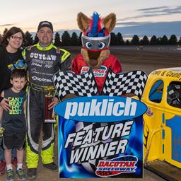 WIEST HOLDS OFF WIEST FOR SEASON OPENER WIN