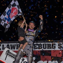 MEMORIAL DAY SPECTACLE: LARSON BEATS BELL, OUTLAWS FOR WIN