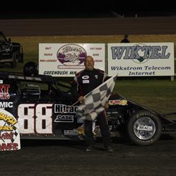 Strand, Greseth, Veert, and Pederson collect GRP checkers