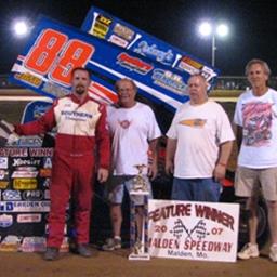Crawley sets new track record and wins O&#39;Reilly USCS Mid-South Thunder race at Malden Speedway.