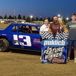 MEIDINGER DRIVES THROUGH FIELD FOR FIRST CAREER WIN