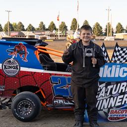 HALLGREN HOLDS OFF DAVENPORT FOR VICTORY