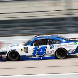 Chad Finchum behind the wheel of the Ted Russell Ford No. 14 SS GreenLight Racing / Ford Mustang at Darlington (S.C.) Raceway on August 31.