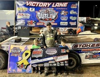 Justin Mintz shows off his $5K check during the Blue Ridge Outlaw Late Model Series at Halifax County Motor Speedway on Saturday, April 27.