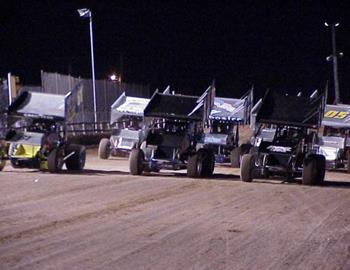 Three-wide salute at Lawton