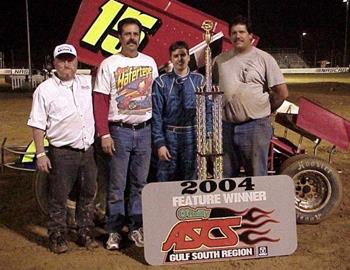 Sam Hafertepe, Jr., and crew in victory lane