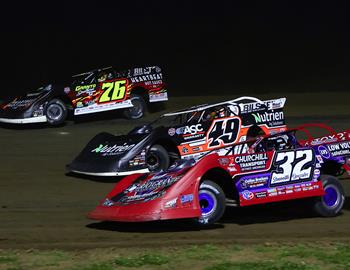 Bobby Pierce (32) - Jonathan Davenport (49) - Brandon Overton (76) battle at Marshalltown Speedway on May 13 (Josh James Artwork image)
