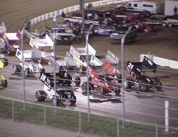 Brian Brown (21), Jason Martin (36) and Tony Bruce, Jr., (18) lead the three-wide salute to the fans