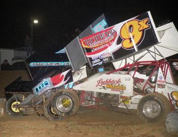 Gary Wright and Zach Pringle tangle in heat race action