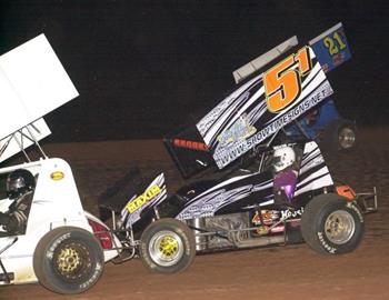 Tommy Bryant (21T) on the top side with Jimmy Brooks (51) knocking on Travis Elliotts (15T) tailtank