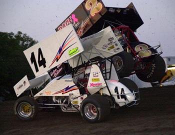 Kenneth Walker (2) gets over the right rear of Michael Lang (14)