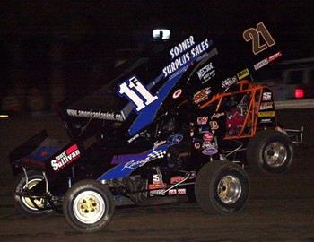 Foster Landon (11F) and Nick Smith (21) race for the lead in B Main action