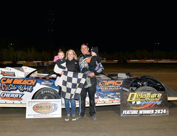 Matt Hill  and his crew celebrate in Victory Lane after winning the Elliott Farms Crate Late Model feature at Delaware International Speedway on Saturday, April 27. 