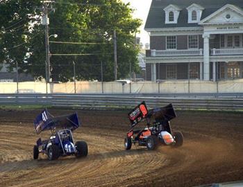 Gary Wright races around Scott Comstock