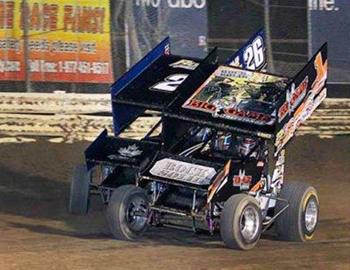 Sam and Sammy Swindell battling for the win at Castrol Perry Nelson