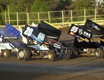 Matt Covington (95) and Rick Barksdale (20) lead the charge off of turn four