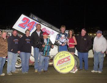 Jack Dover with family and crew in victory lane