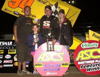 Wayne Johnson and company in victory lane