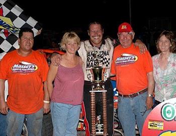 Charles Davis, Jr., and company in victory lane