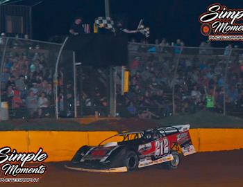 Josh taking the checkered flag at Duck River Raceway Park on July 3.