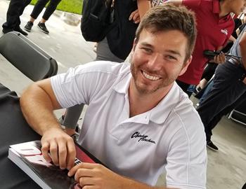 Chad Finchum signing autographs at Daytona.
