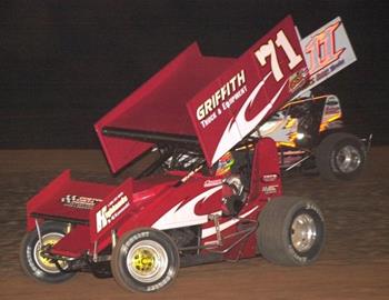 Channin Tankersley (71) and Jason Johnson (11) battle for position early in the feature