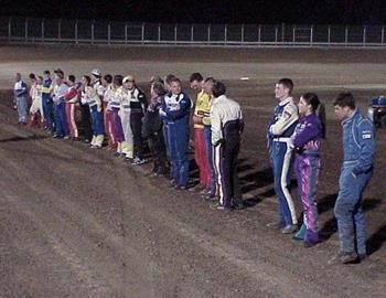 The drivers line the front straightaway