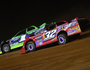 Bobby Pierce (32) pursues Tyler Erb for the lead at Lernerville Speedway on August 21, 2024. (Josh James Artwork image)