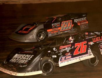 Jimmy Owens battling Brandon Overton (Rick Neff image) at Volunteer Speedway on April 6. (Rick Neff image)