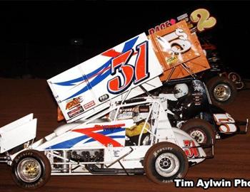 Brandon Berryman (31), Danny Smith (5$) and Kenneth Walker (2) at Lawton