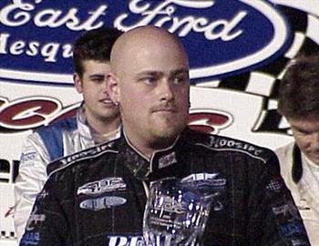 Toby Brown receives his award during opening ceremonies.