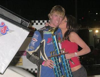 Jack Dover enjoys the spoils of victory lane