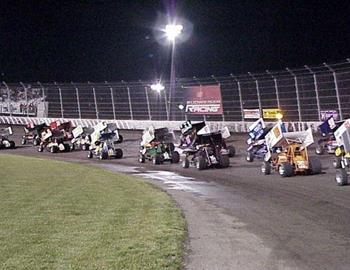 Three-wide through turns three and four