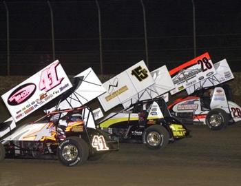 Jason Johnson (41), Nick Smith (15s) and Jonathon Cornell (28) lead the three-wide