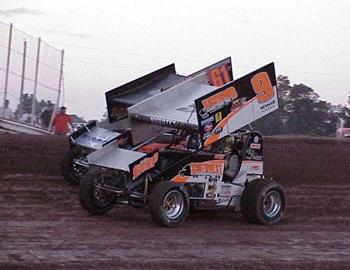 Gary Wright passes Toby Brown to win a heat race